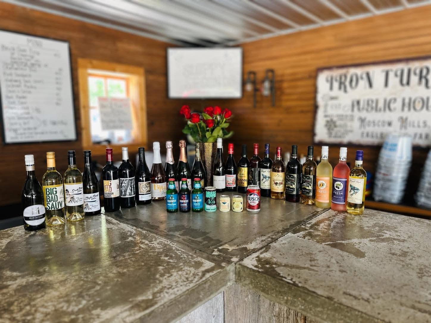 The wine and drink selection displayed across the Iron Turbine bar.